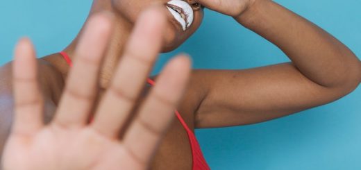 african american female holding out palm in stopping gesture