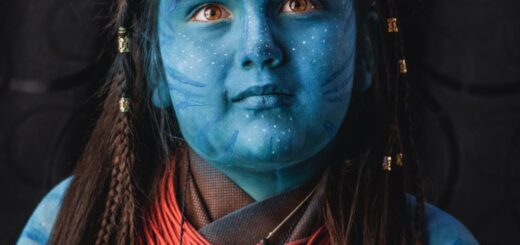 a kid with blue face paint