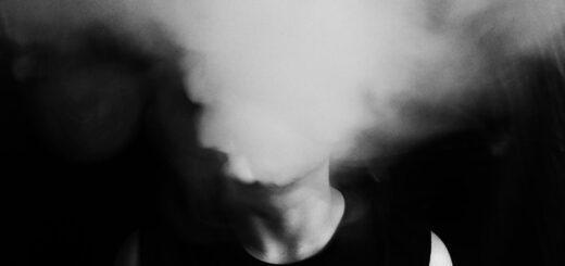 close up of person emitting smoke